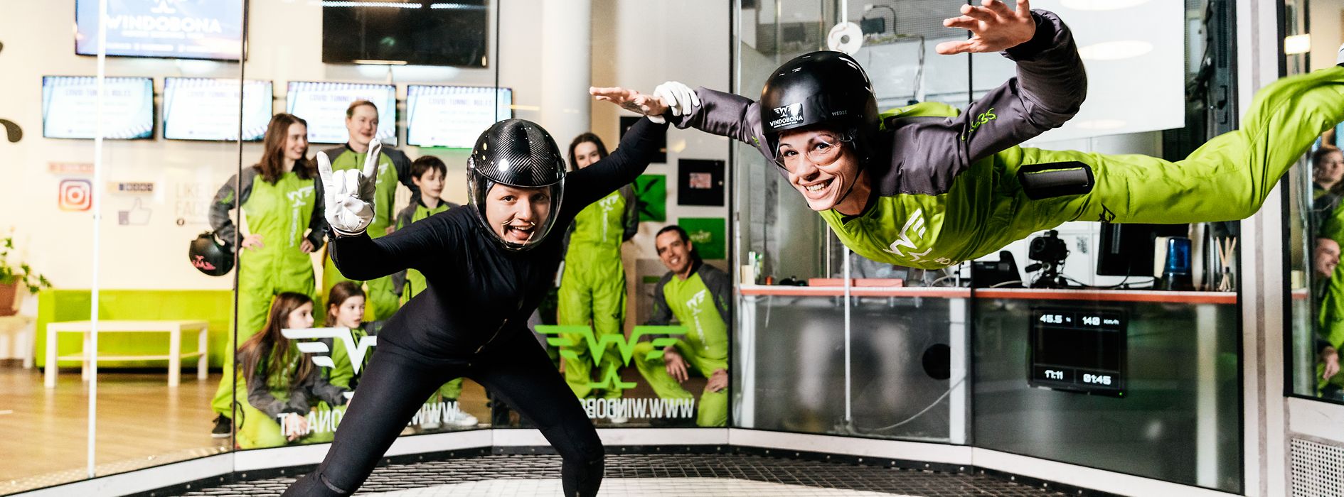 Two people in a wind tunnel