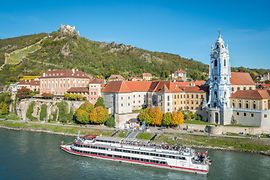 Ship on the Danube in front of city scenery